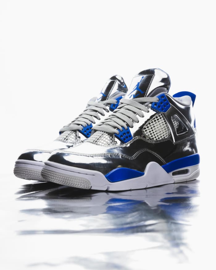 Side view of Usher's silver and blue Air Jordan sneakers from the Super Bowl halftime show.